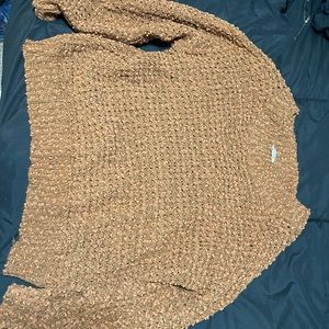 brand new never worn copper sweater can be worn off the shoulder